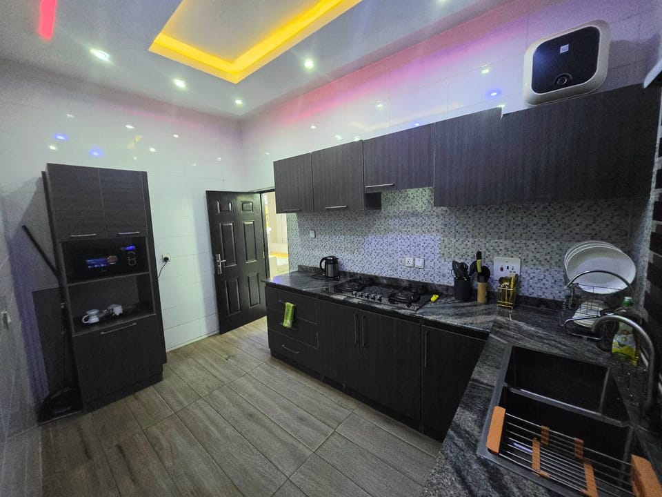 Economy Apartment, Balcony, City View | Private kitchen | Fridge, microwave, oven, stovetop