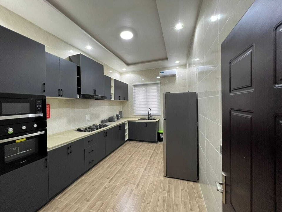 Classic Apartment, Balcony, City View | Private kitchen | Fridge, microwave, oven, stovetop