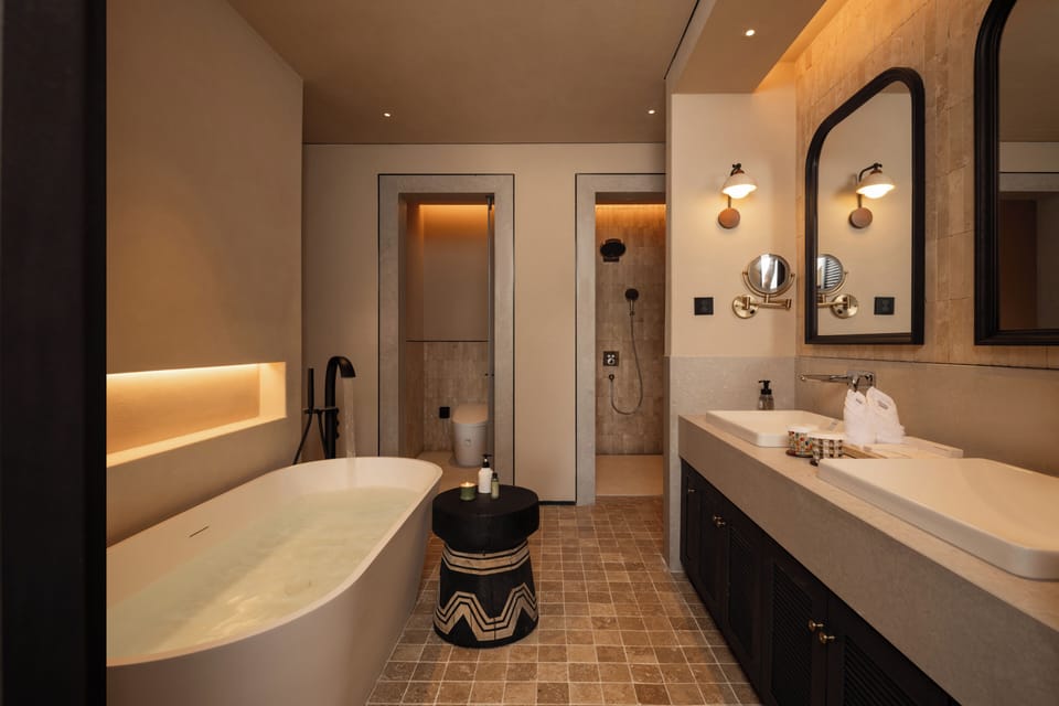 Luxury Double Room, Ocean View | Bathroom | Separate tub and shower, hair dryer, slippers, towels