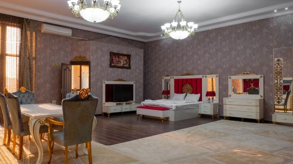 Luxury Double Room, 1 King Bed, Garden View | Desk, laptop workspace, soundproofing, iron/ironing board