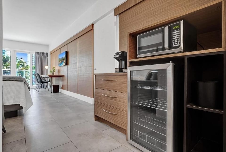 Grab a quick snack with mini-fridge and microwave convenience.