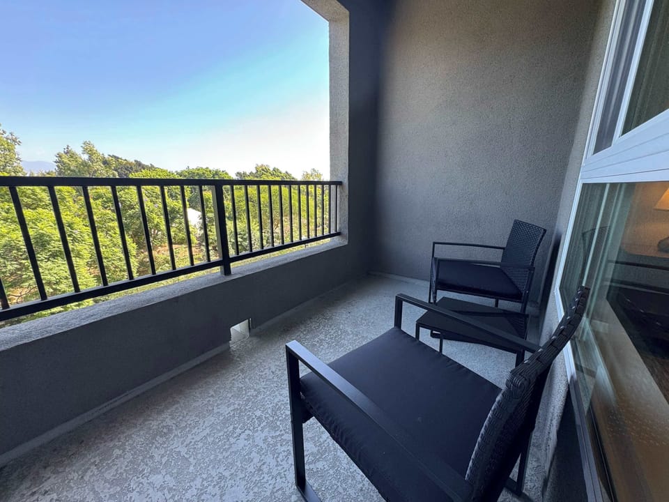 Enjoy stunning views of the iconic city from your own private balcony