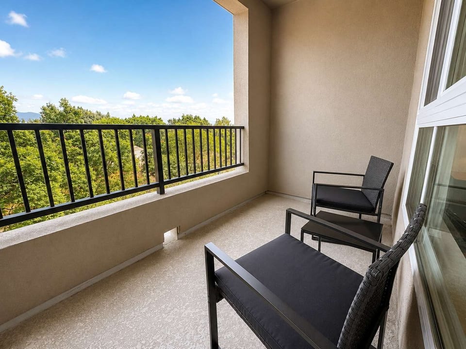 Enjoy stunning views of the iconic city from your own private balcony