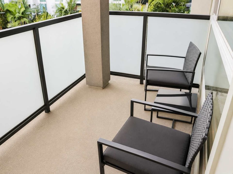 Enjoy stunning views of the iconic city from your own private balcony