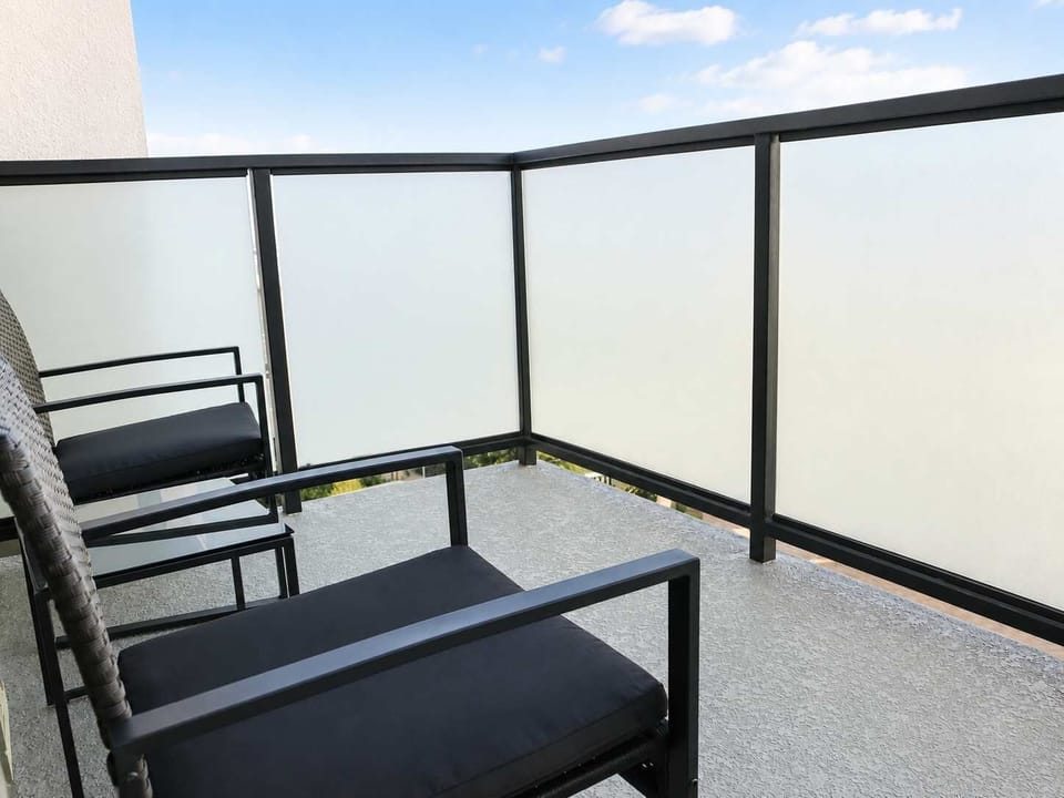 Enjoy stunning views of the iconic city from your own private balcony