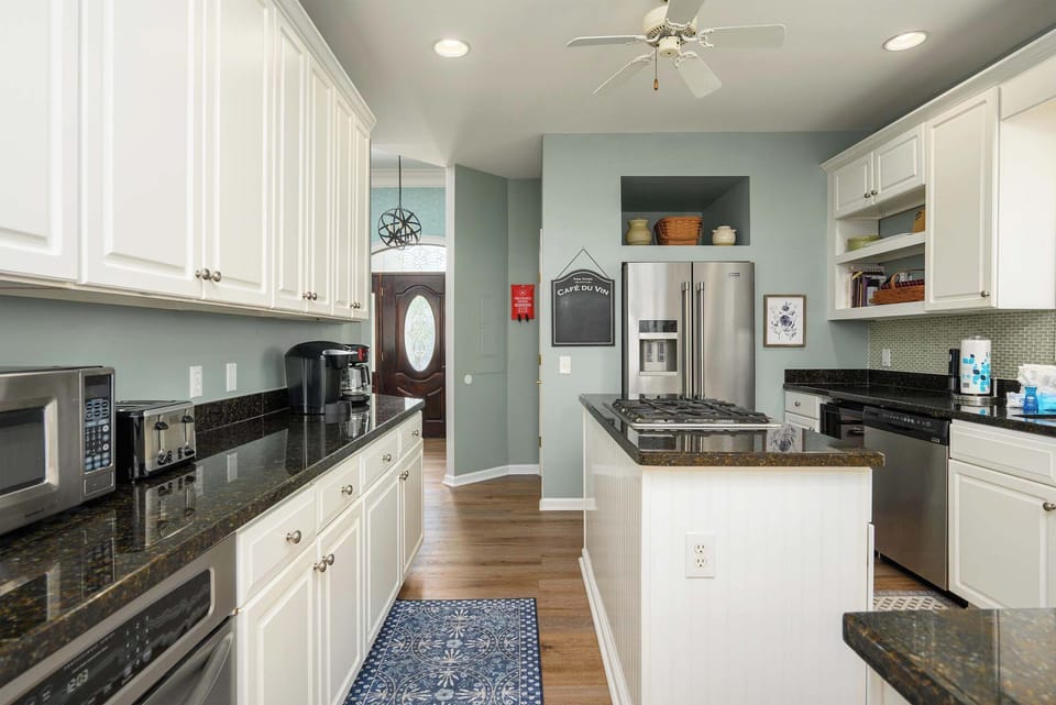 Chefs kitchen with granite counters 