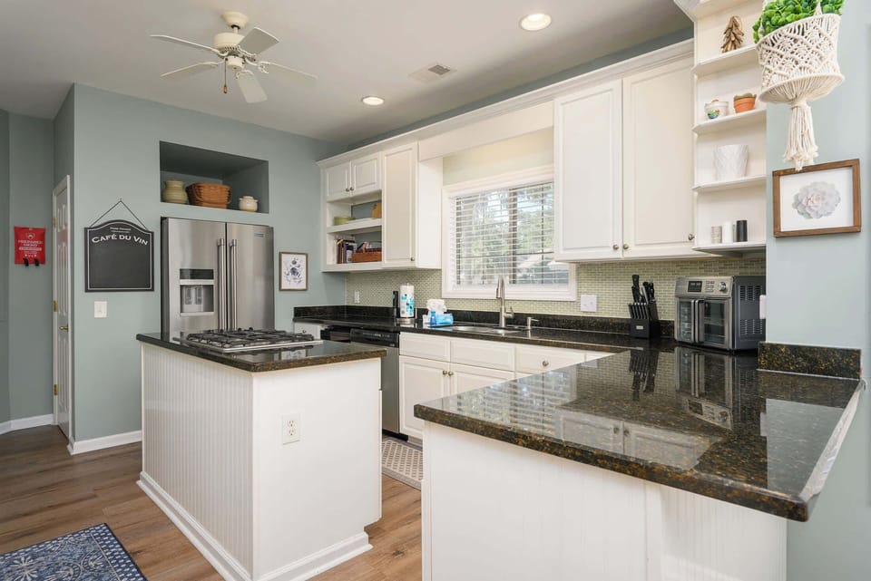 Chefs kitchen with granite counters 