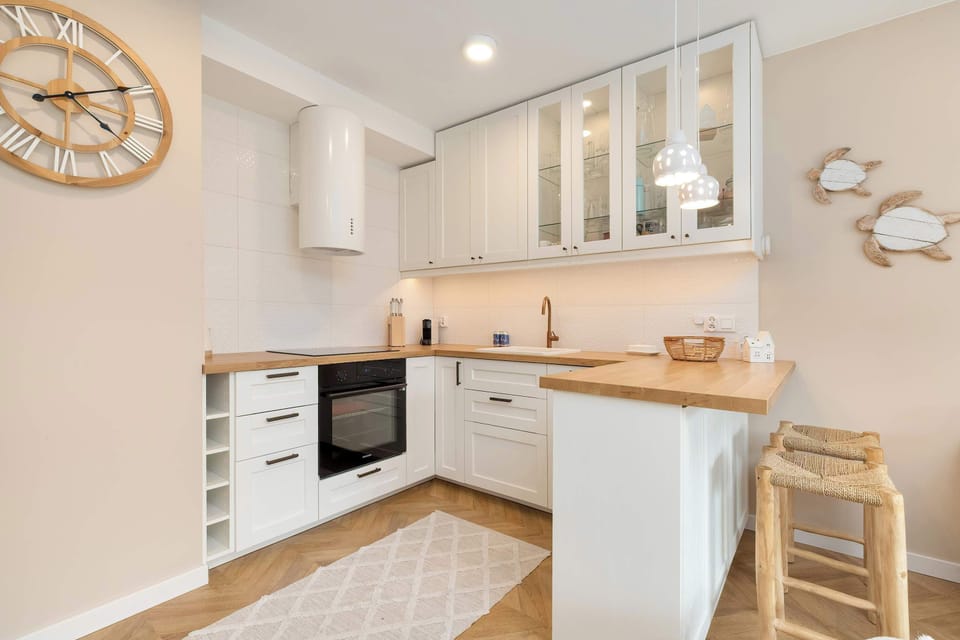 The fully equipped kitchenette includes everything you need for a home-cooked meal.