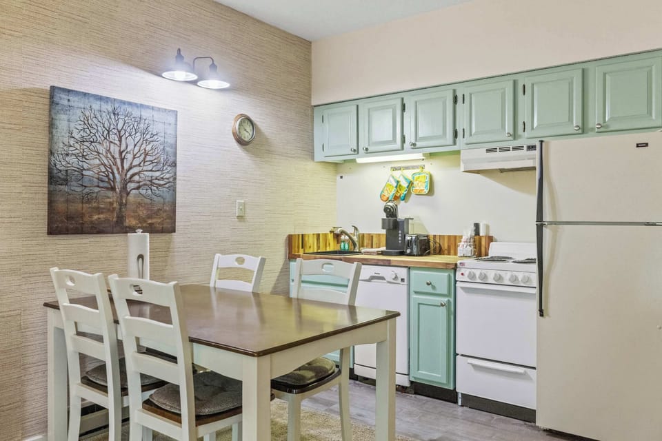 Prepare meals in the fully equipped kitchen, then sit down to enjoy them at the spacious dining table for four