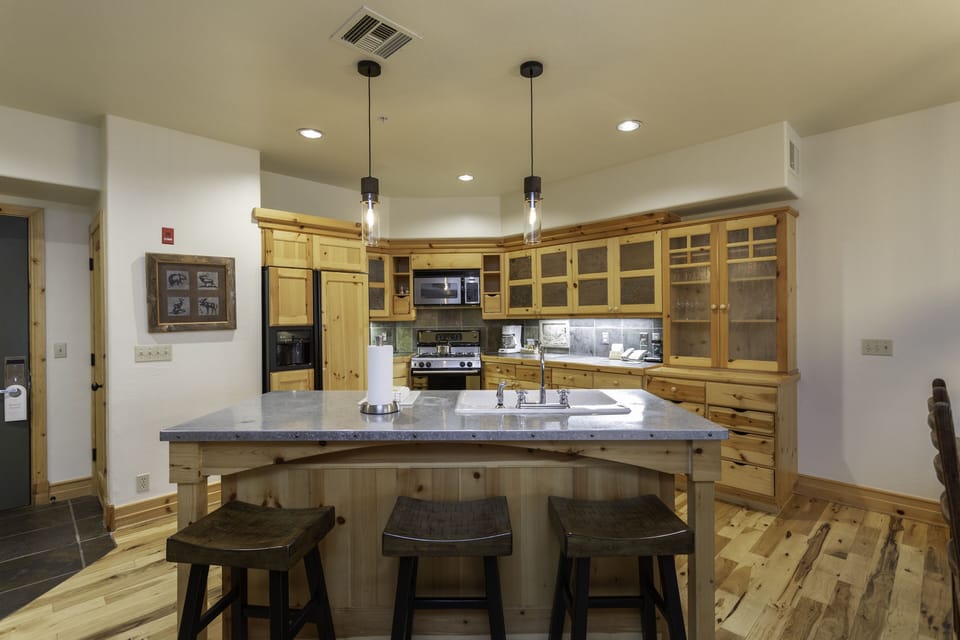 Condo, 2 Bedrooms | Private kitchen | Fridge, oven, dishwasher, coffee/tea maker