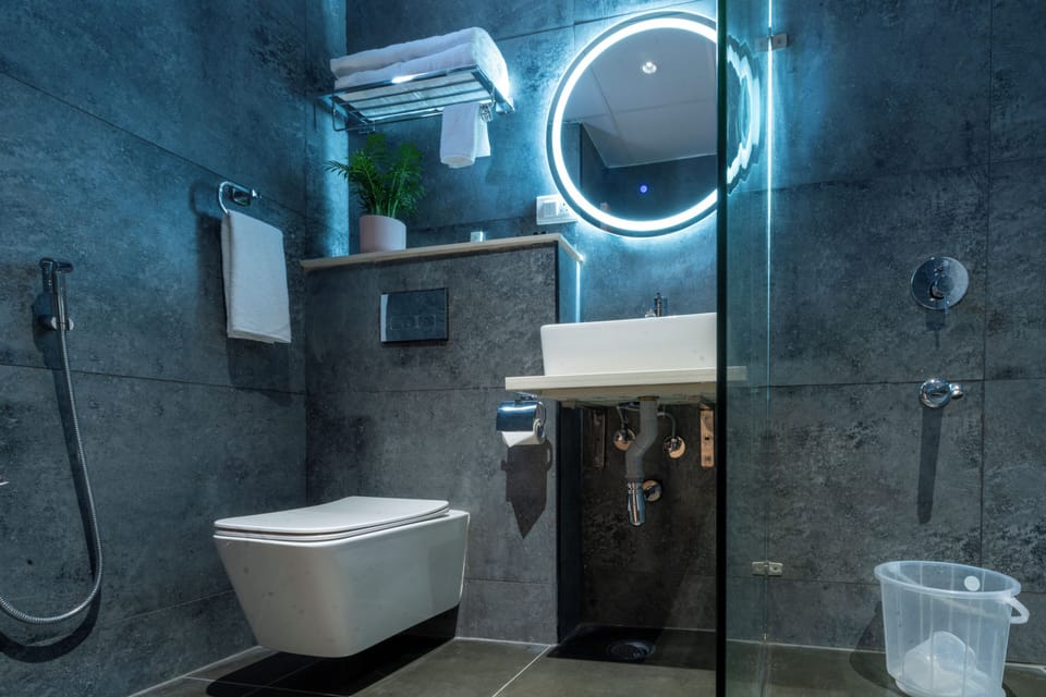 Shower, hair dryer, slippers, towels