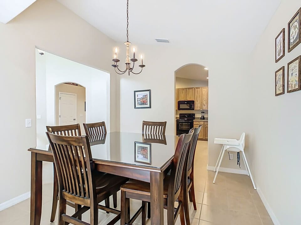 Enjoy family meals together—this dining space even includes a highchair for your convenience.