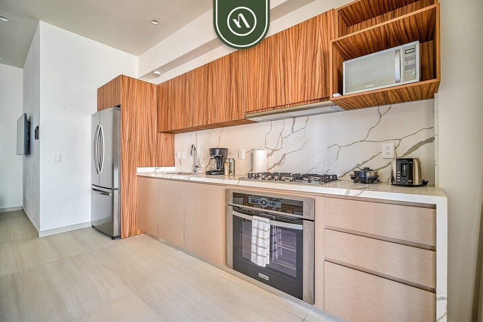 Apartment, 1 King Bed with Sofa bed, Jetted Tub, Ocean View (Maralma Indigo 306) | Private kitchen