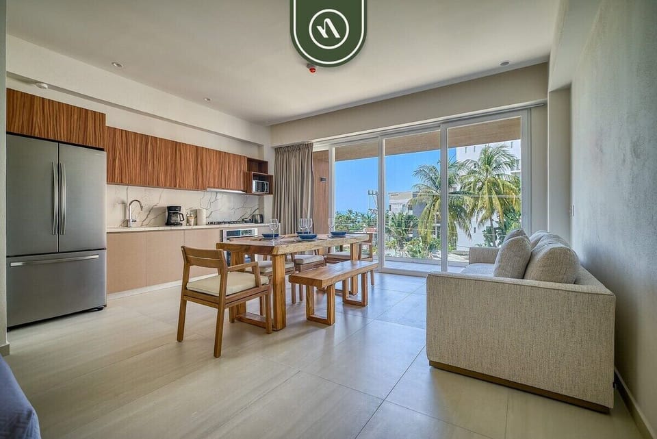 Apartment, 1 King Bed with Sofa bed, Jetted Tub, Ocean View (Maralma Indigo 306) | Living area