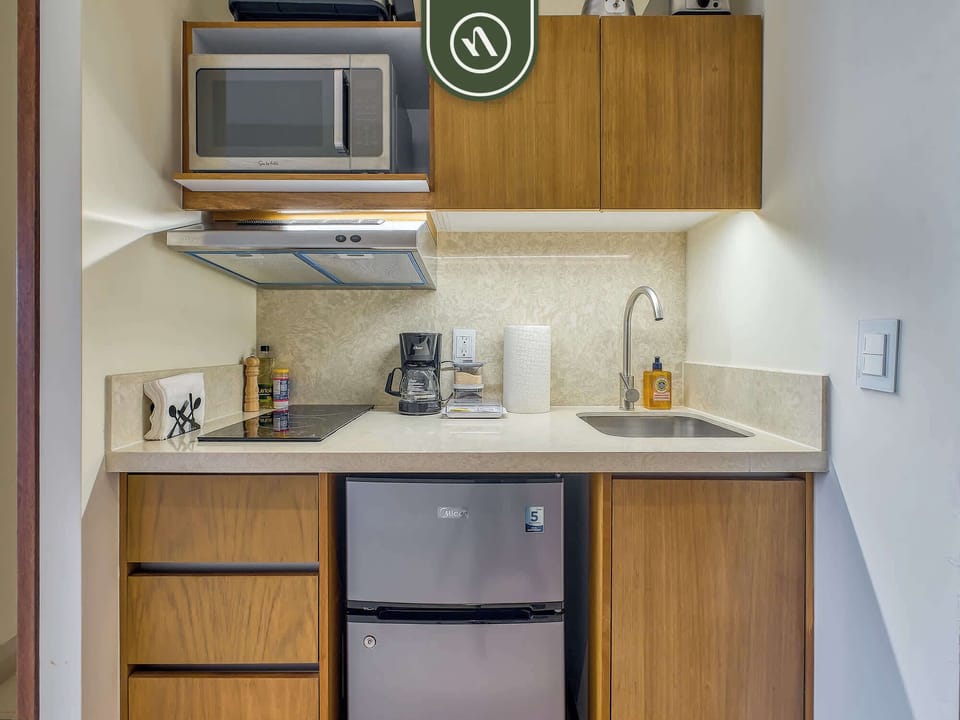 Apartment, 1 King Bed, Kitchen, Pool View (Residences by Mio) | Private kitchen | Dining tables
