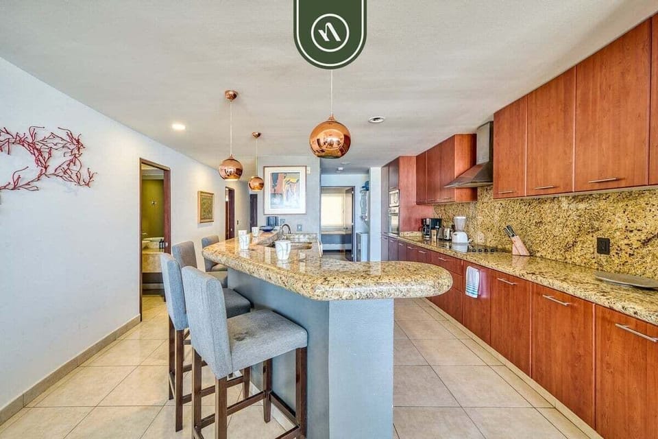 Apartment, Multiple Beds, Pool Access, Ocean View (Villa Magna 294) | Private kitchen | Dining tables