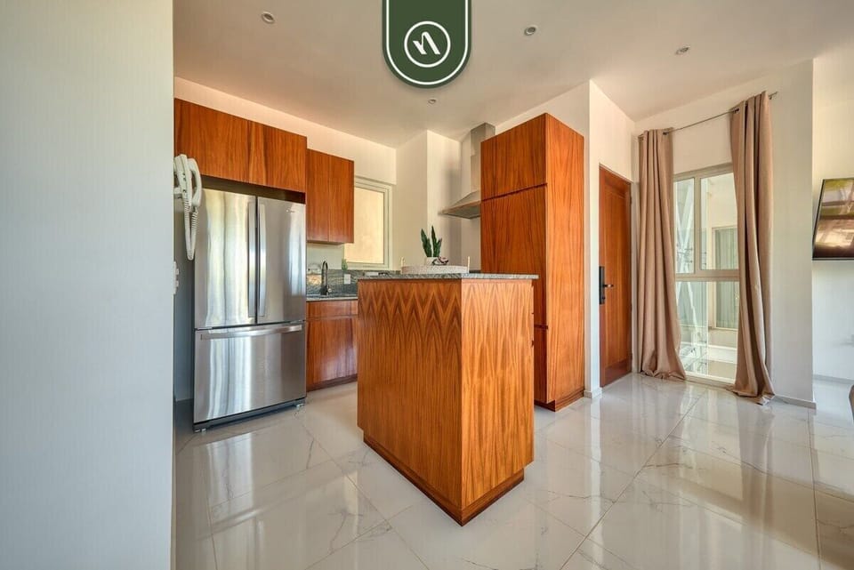 Apartment, Multiple Beds, Balcony (Grand Trianon 405) | Private kitchen | Dining tables