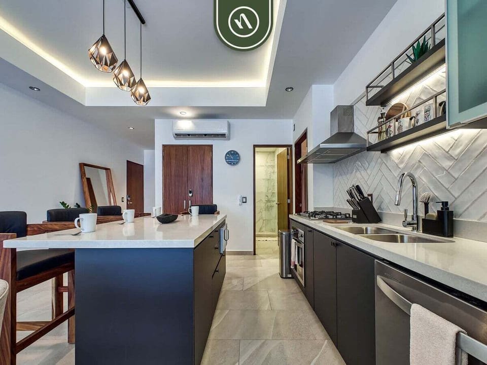 Condo, Multiple Beds, Pool Access, Mountain View (Esquina Versalles 204) | Private kitchen | Dining tables