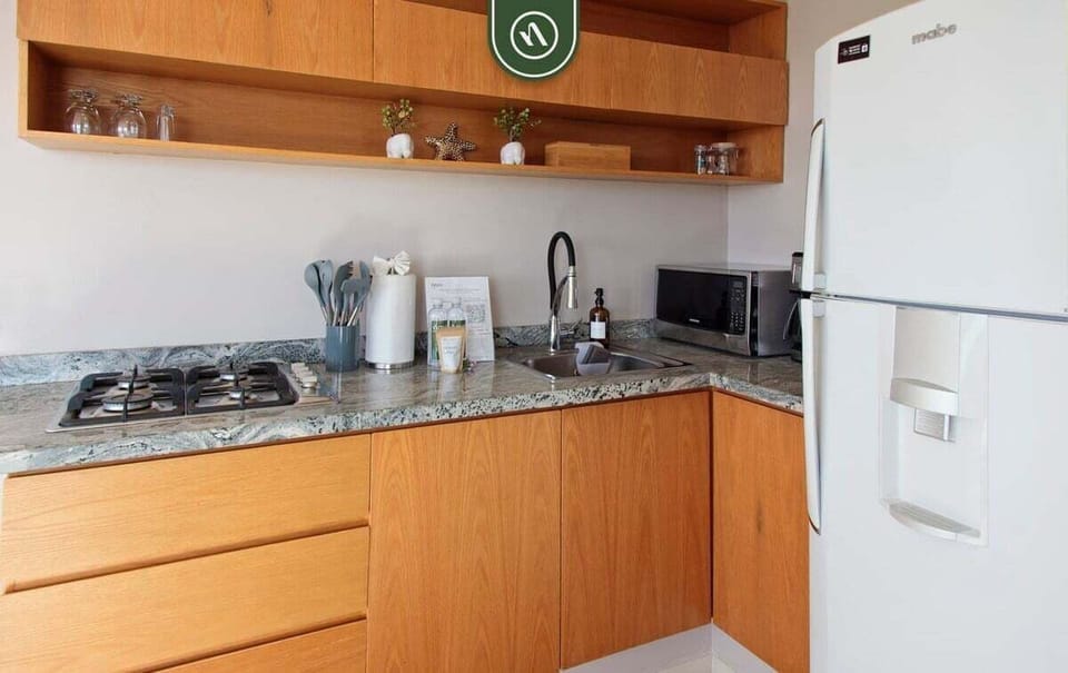 Apartment, 2 Double Beds, Pool Access, Ocean View (Aria Ocean T1 702) | Private kitchen | Dining tables
