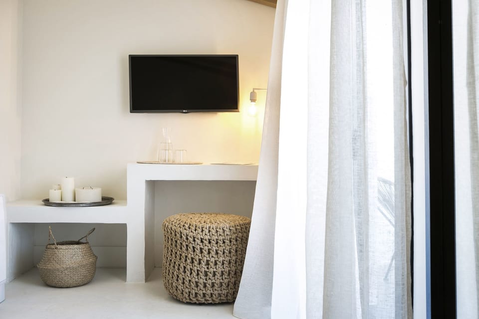Superior Double Room, Partial Sea View | In-room safe, soundproofing, iron/ironing board, free cribs/infant beds