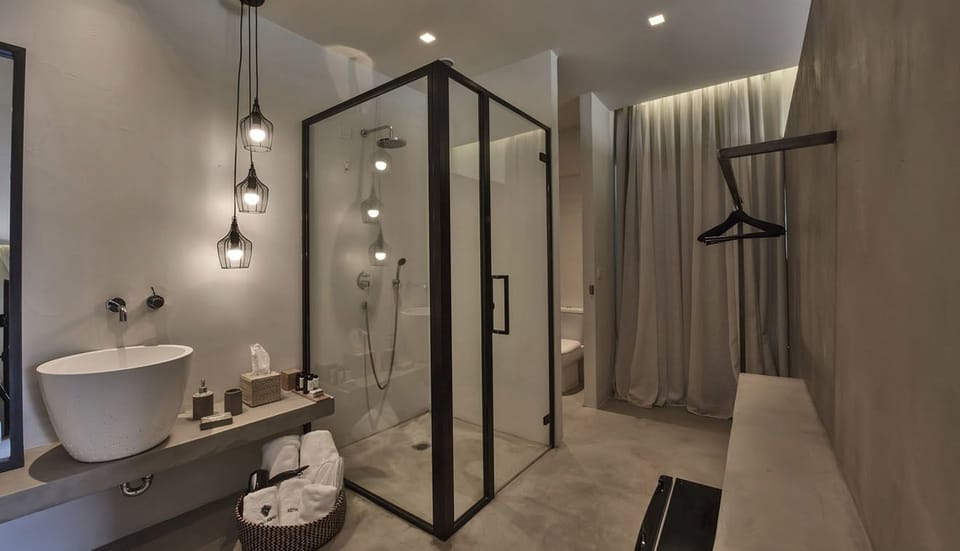 Grand Suite, Sea View | Bathroom | Shower, designer toiletries, hair dryer, bathrobes