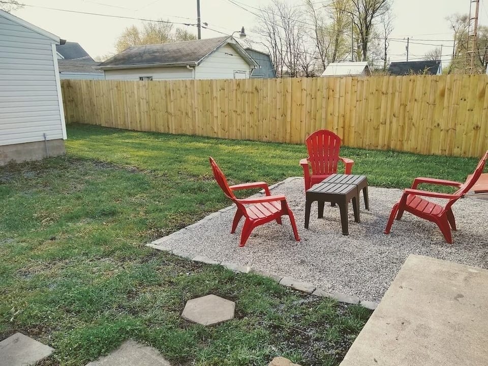 Fully enclosed backyard with outdoor seating