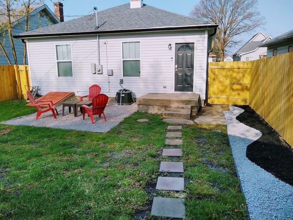 Fully enclosed backyard with outdoor seating