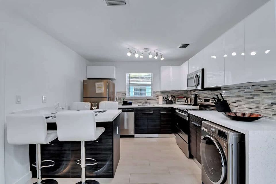 Whip up home-cooked meals in a fully equipped kitchen featuring all essential cookware.