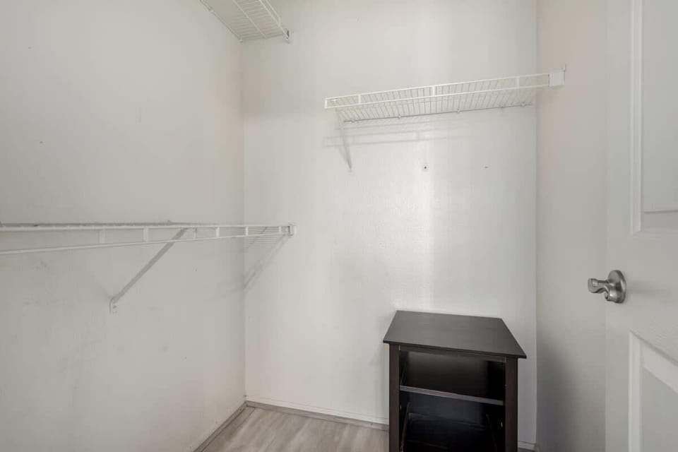 Ample clothing storage with dressers and closet space for your stay.