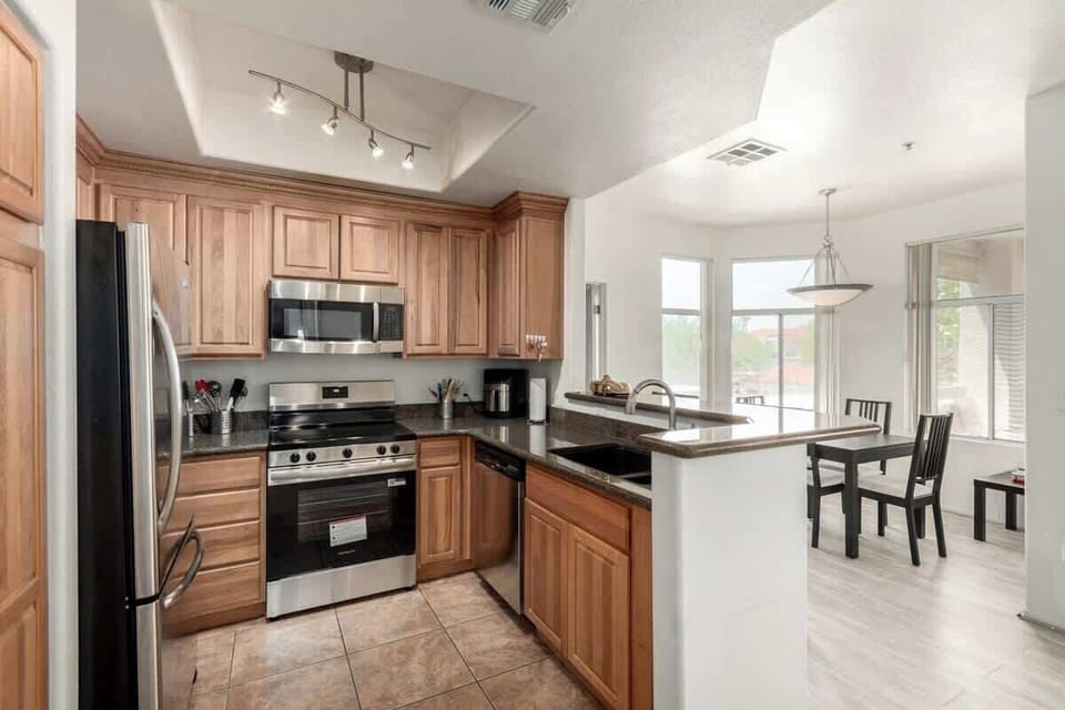 Fully equipped kitchen with modern appliances and plenty of counter space.