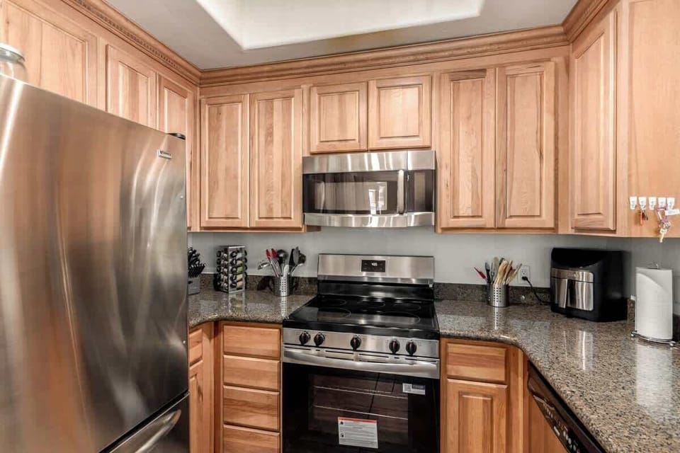 Fully equipped kitchen with modern appliances and plenty of counter space.