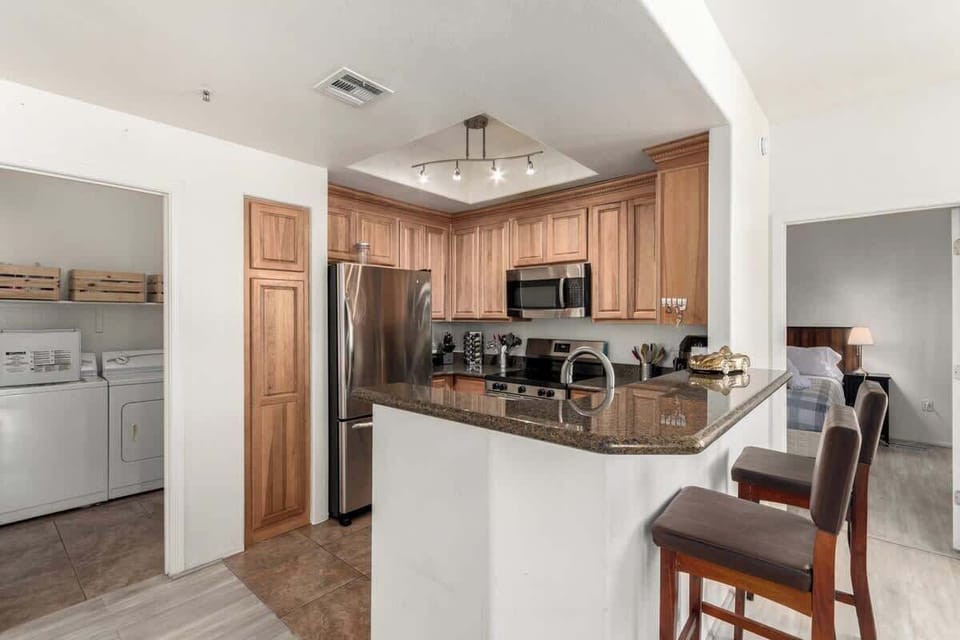 Fully equipped kitchen with modern appliances and plenty of counter space.