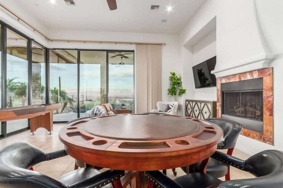 Shuffleboard, poker table, and plenty of games.