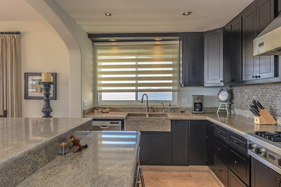 Apartment, Multiple Beds, Balcony, Ocean View (Tortuga Bay TBB 2401) | Private kitchen | Dining tables