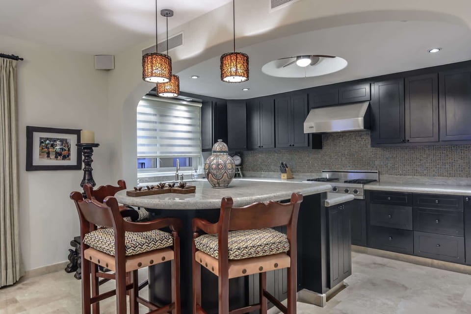 Apartment, Multiple Beds, Balcony, Ocean View (Tortuga Bay TBB 2401) | Private kitchen | Dining tables