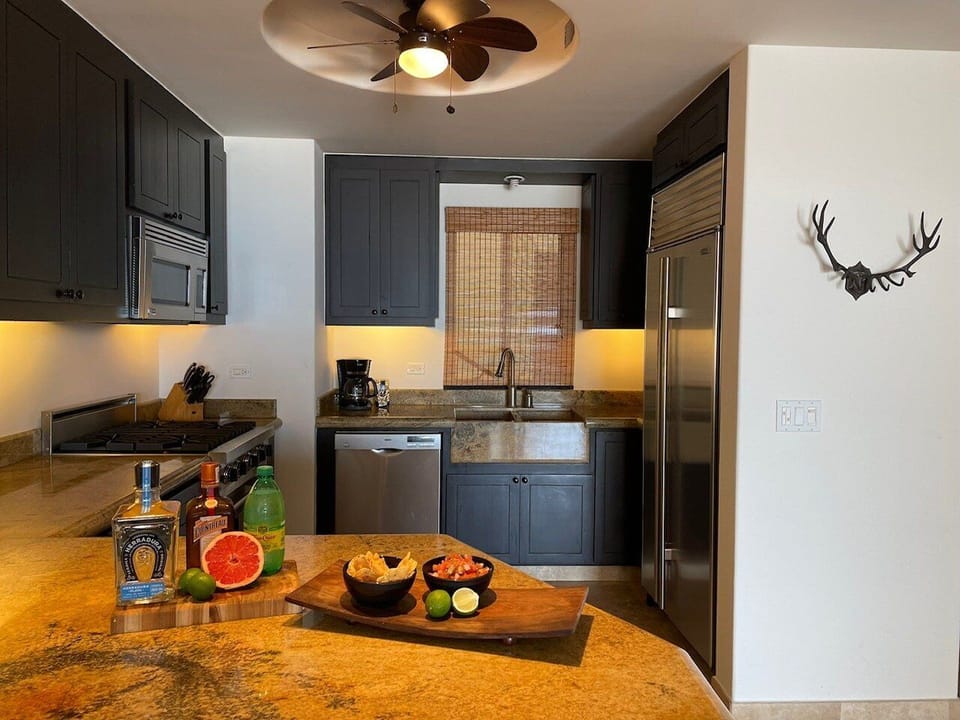 Apartment, Multiple Beds, Balcony, Ocean View (Tortuga Bay TBB 2502) | Private kitchen | Dining tables