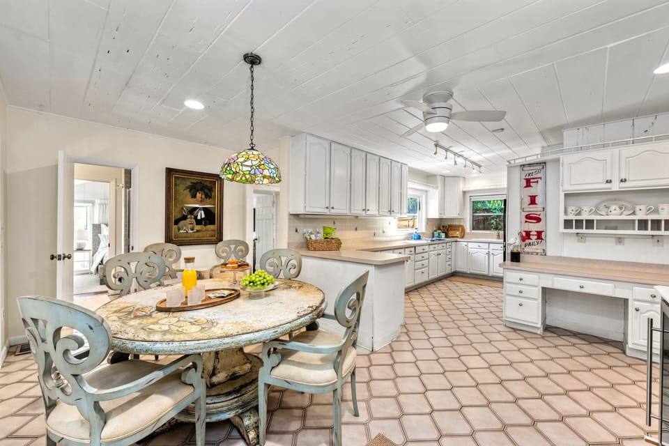 Bright and beachy, the kitchen is fully stocked and ready — just add seafood, sunshine, and good company.