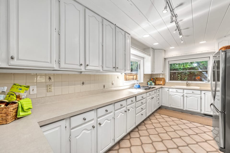 Expansive counters offer room for prepping fresh seafood or laying out snacks for a beach day.