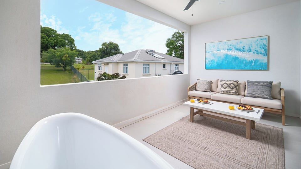 Bathrooms are crisp and elegant, designed for both practicality and indulgence.