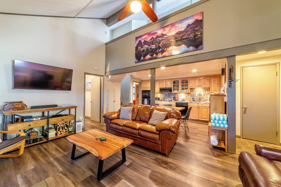 Living room has TV w/ smart features.