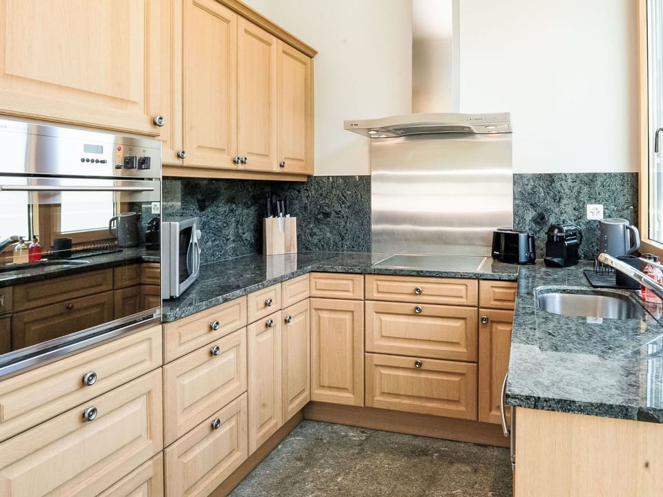 Kitchen, Countertop, Cabinetry, Kitchen Appliance, Flooring, Wood, Interior Design, Drawer, Floor, Major Appliance