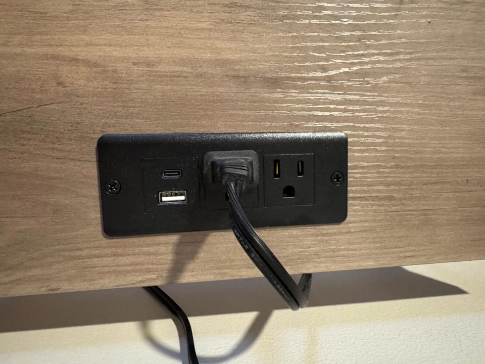 Nightstands have phone plugs