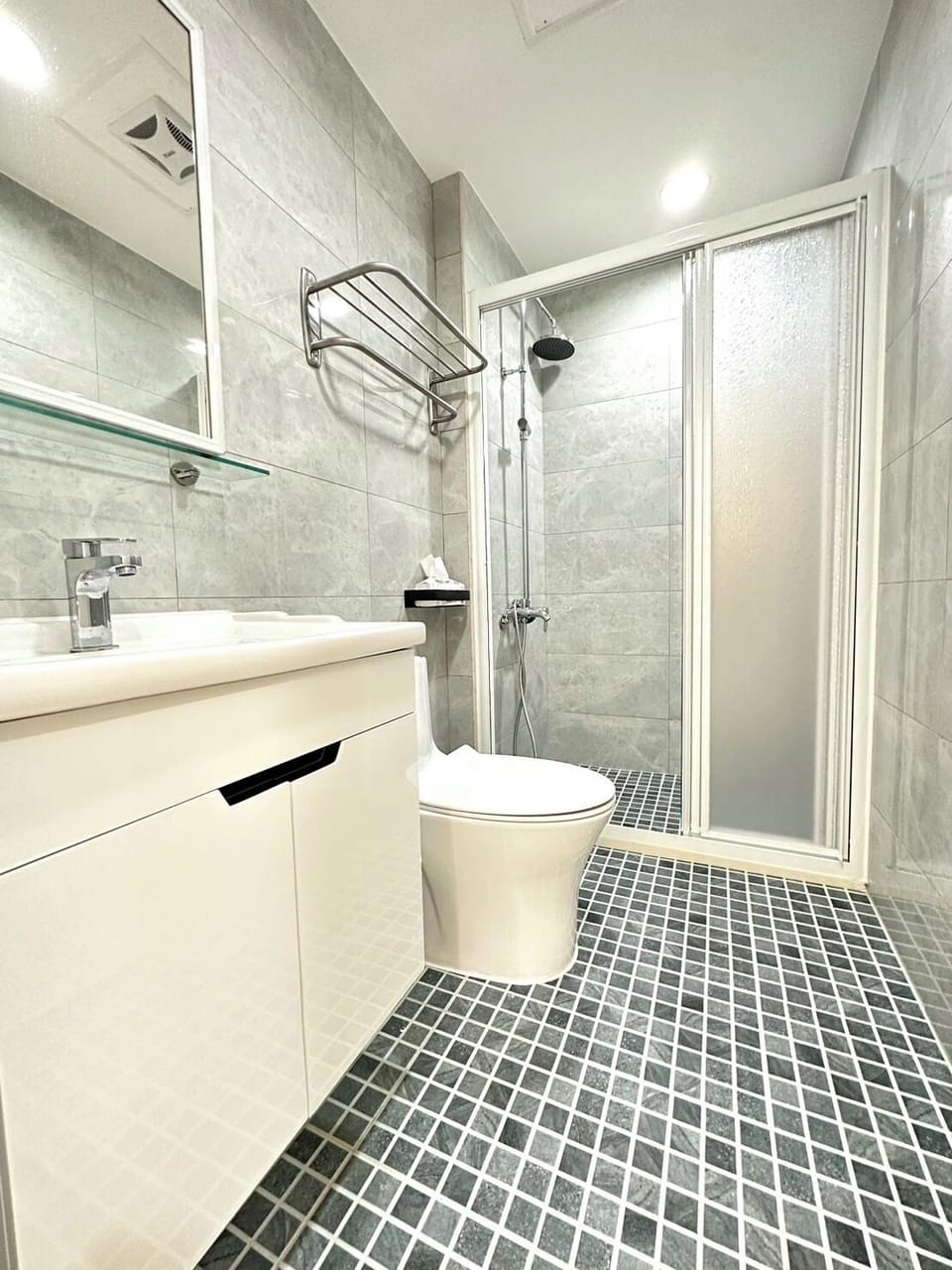 Shower, hair dryer, soap, shampoo