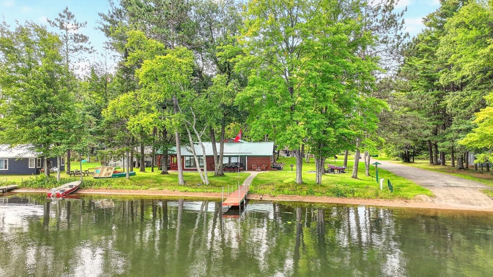 The home has a large, park-like yard situated directly next to the public boat launch for easy access. The home has a private dock for fishing or docking your boat.