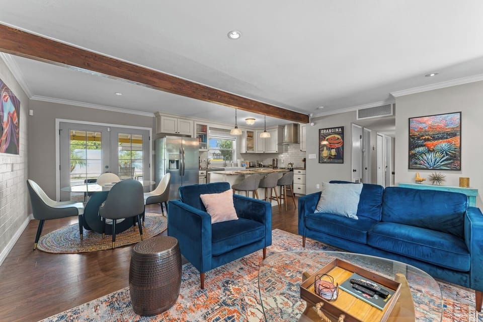 Full open-concept view — living, dining, and kitchen all in one connected space.