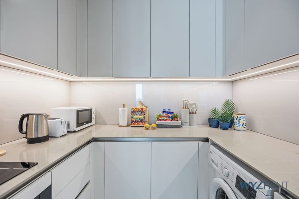 Luxury Apartment, 1 Bedroom, Canal View | Private kitchen | Coffee/tea maker, electric kettle, highchair