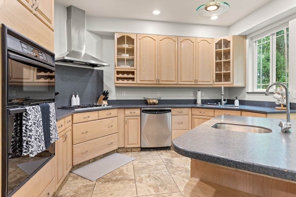 Fully equipped kitchen with modern appliances and plenty of counter space.