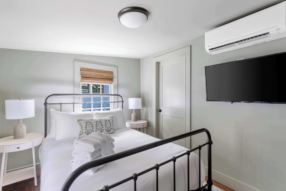 Bedroom 3: Cozy double retreat with a TV and all the comforts of home.