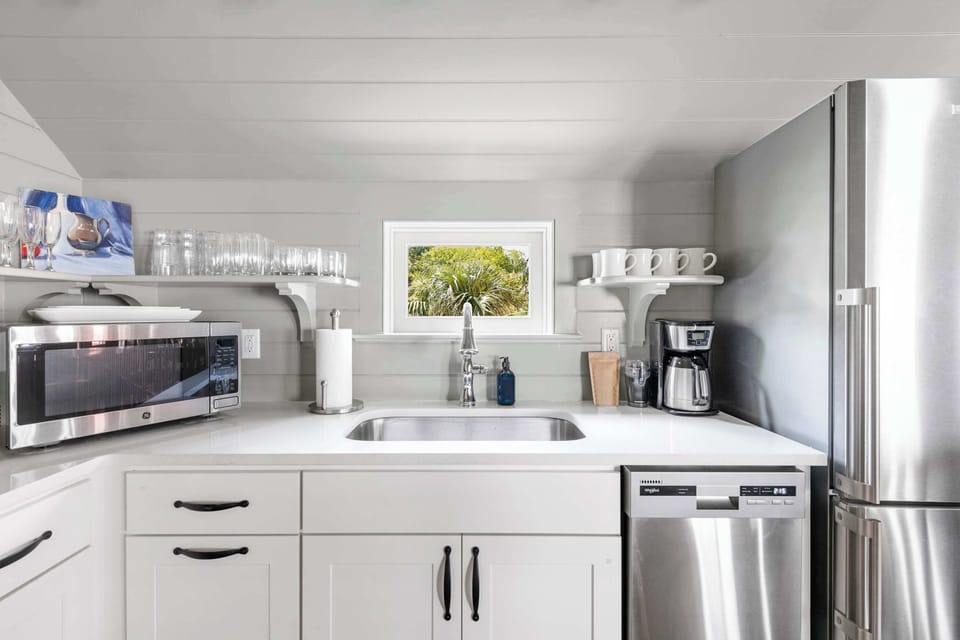 Fully equipped kitchen featuring modern appliances and everything you need to prepare meals at home.