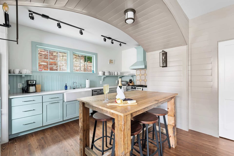 Dining area and modern, upgraded kitchen with everything you need. Ask us about our private chef experiences!
